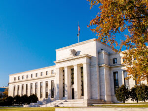Fed likely to leave rates alone but signal readiness to cut